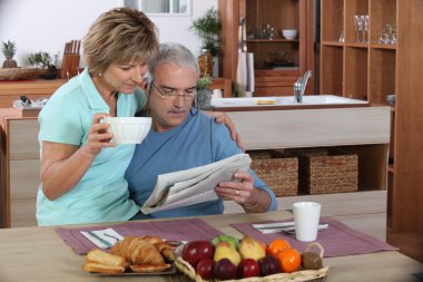 Older couple reading clipart