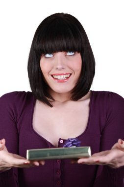 An ecstatic woman receiving a gift clipart