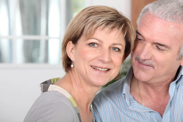 Middle-aged couple at home — Stock Photo, Image