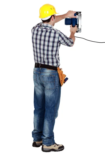 Artesano trabajando con una sierra eléctrica —  Fotos de Stock