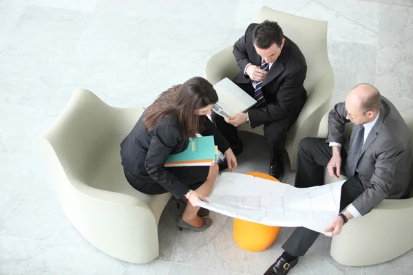 Businesspeople having a meeting, top view — Stock Photo, Image