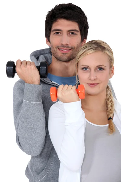 Couple working out together Stock Photo