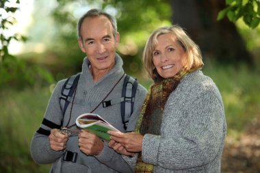 Senior couple going for a walk clipart