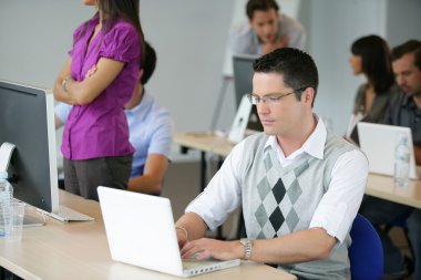 Adults attending a workshop clipart