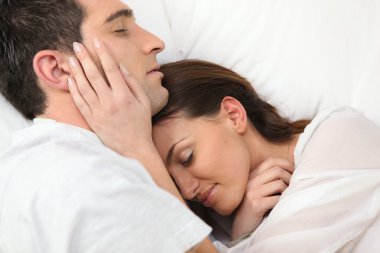 Couple sleeping together clipart