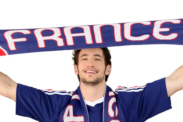 French soccer fan waving scarf — Stock Photo, Image