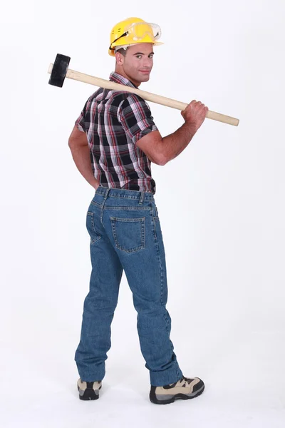 Landscape picture of worker with shoulder harness — Stock Photo, Image