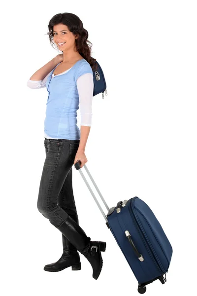 Mladá žena s zavazadla — Stock fotografie