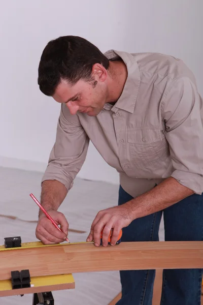 Handyman com lápis de chumbo — Fotografia de Stock
