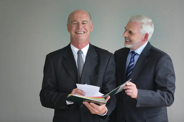 Laughing senior businessmen — Stock Photo, Image