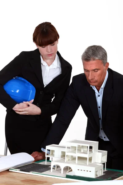 Architects looking at their design — Stock Photo, Image