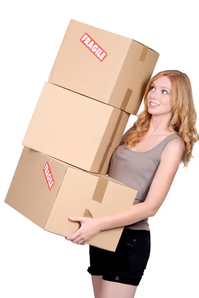 Pelirroja mujer llevando cajas de cartón —  Fotos de Stock