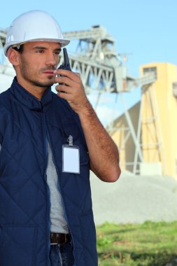 Construction worker on a site clipart