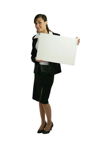 Empresária segurando placa em branco — Fotografia de Stock