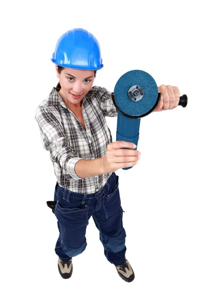 Woman holding angle-grinder — Stock Photo, Image