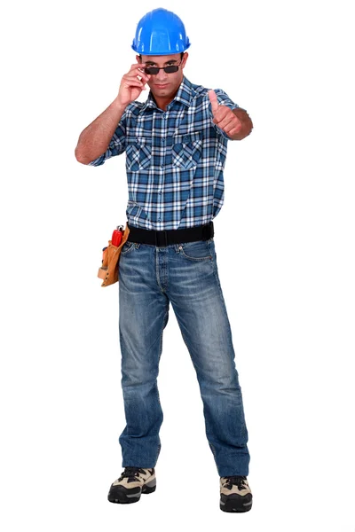 Confident construction worker on white background — Stock Photo, Image