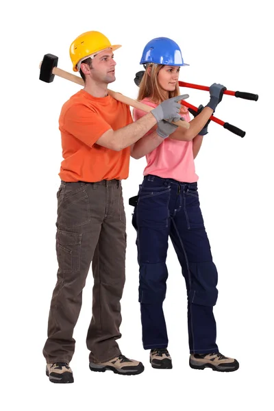 Equipe de construção com cortadores de parafusos e uma marreta — Fotografia de Stock