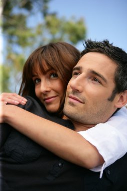 Couple looking at the sky clipart