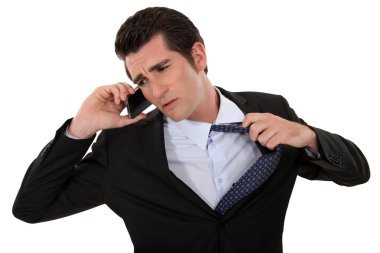 Man eager to end a telephone conversation clipart