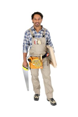 Carpenter holding door and saw clipart