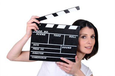 Woman with movie slate clipart