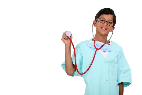 Pojke klädd som en läkare — Stockfoto