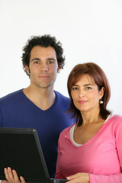 Couple with a laptop — Stock Photo, Image