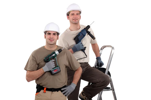 Due artigiani con trapano — Foto Stock