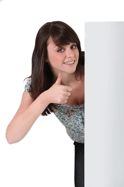 Girl with panel and thumb up — Stock Photo, Image