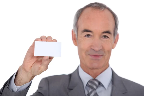 Homem mostrando cartão de visita — Fotografia de Stock