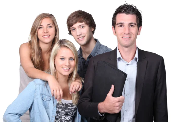 Adult and teenagers smiling — Stock Photo, Image