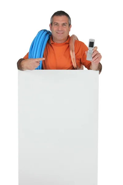 Plumber with a telephone — Stock Photo, Image