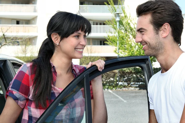 Smiling couple going for a ride Royalty Free Stock Photos