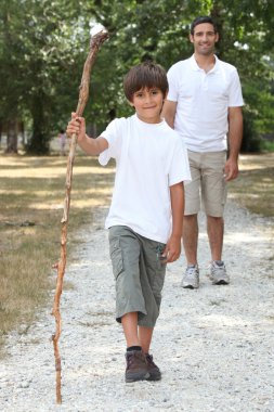 Father and son hiking clipart