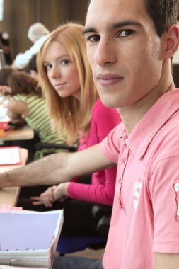 Students sat in rows clipart