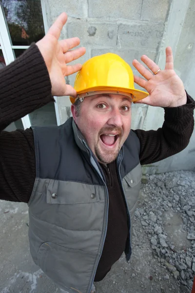 Alarmed construction worker — Stock Photo, Image