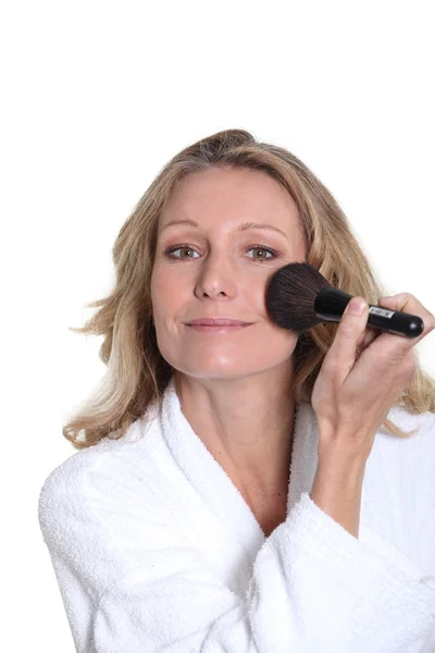 Kobieta wprowadzenie makijaż Obrazek Stockowy