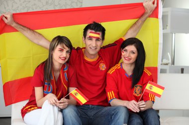 Thee excited Spanish soccer fans clipart