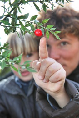 Father teaching son about nature clipart