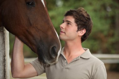 Man stood with horse clipart