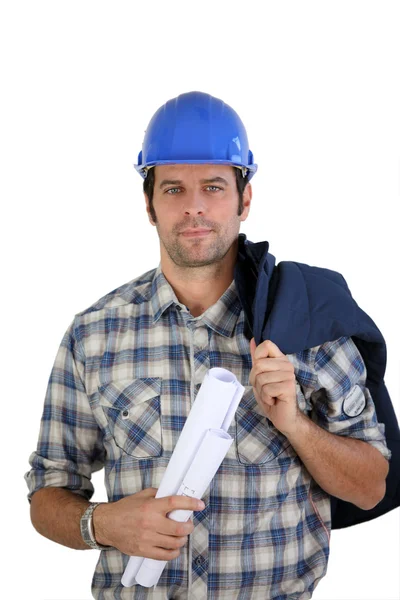Inženýr drží plány — Stock fotografie