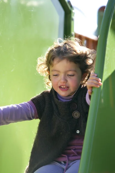 Girl on a slide — Stock Photo, Image