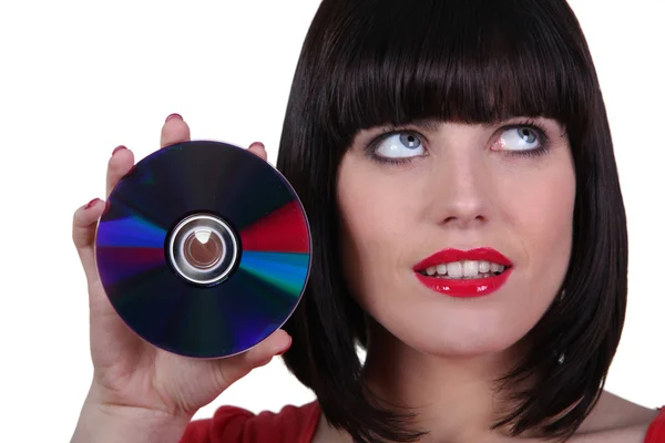 Kobieta wyświetlone cd — Zdjęcie stockowe