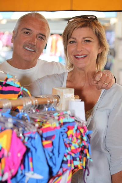Mature couple in a store — Stock Photo, Image