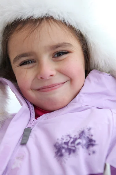 Gülen kız kış ceket — Stok fotoğraf