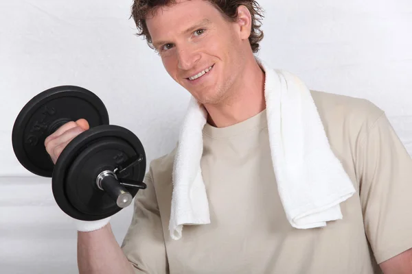 Man lifting weights — Stock Photo, Image