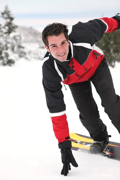 Iron man med snowboard — Stockfoto
