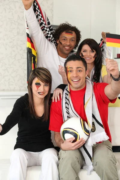 Two couples supporting German football — Stock Photo, Image