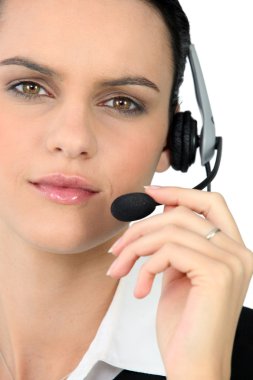 Close up of brunette with earphones clipart