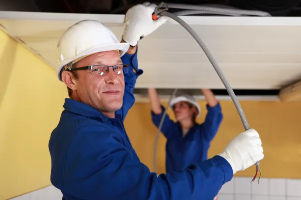 Electricians at work — Stock Photo, Image